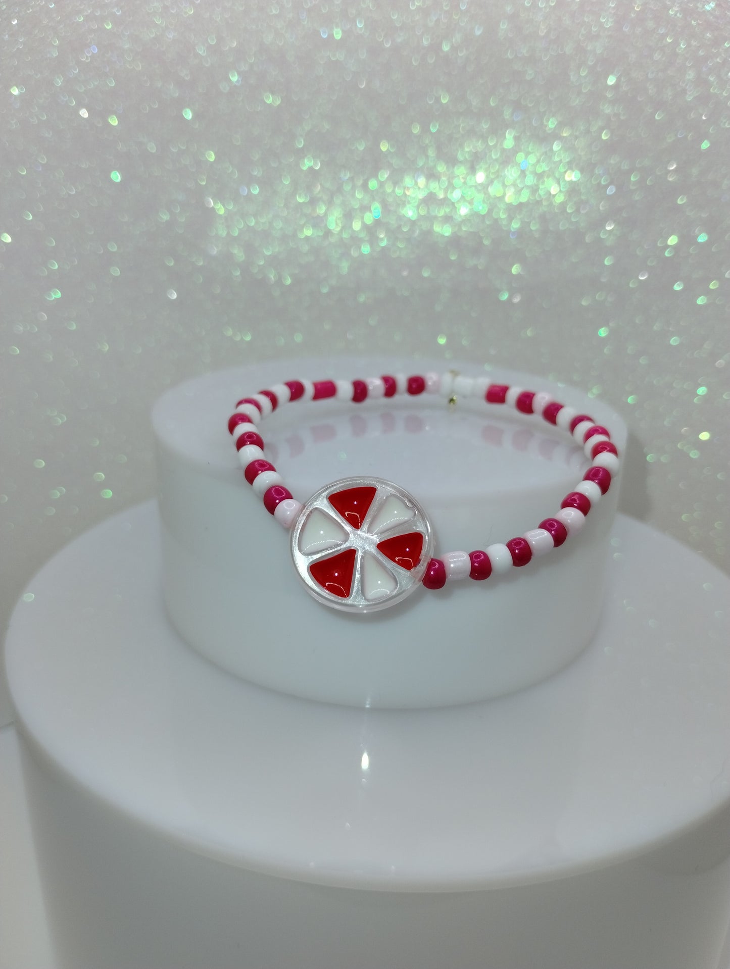 Micro Bead Bracelet w/Red & White Wheel Charm